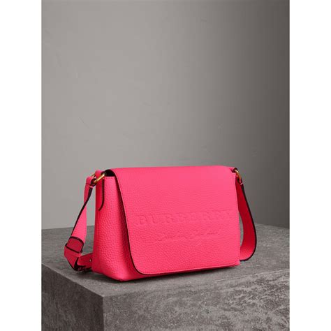 um messenger neon pink|Burberry Neon Pink Embossed Logo Messenger Bag .